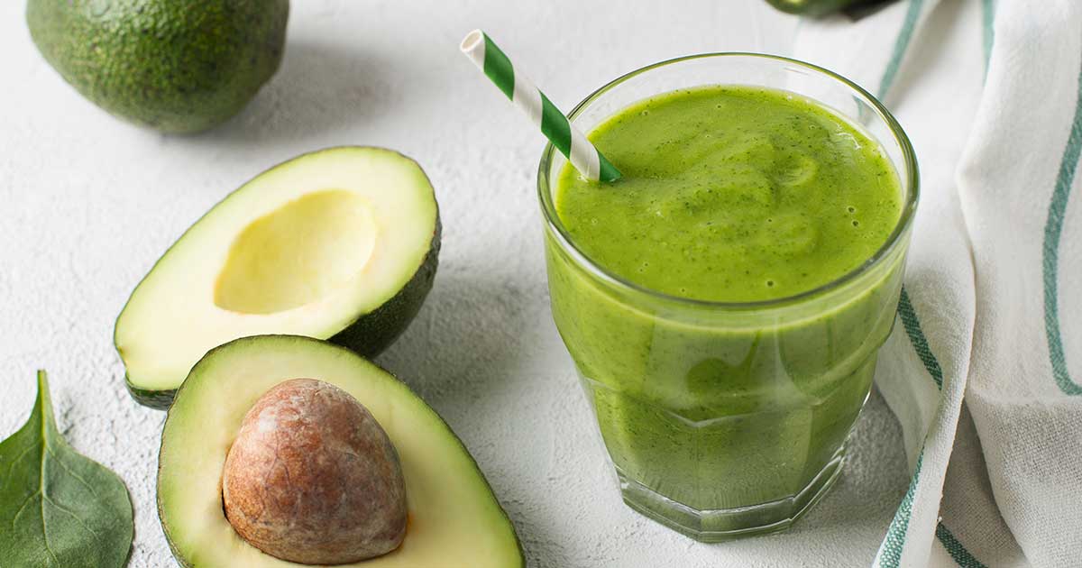 healthy green smoothie and avocado