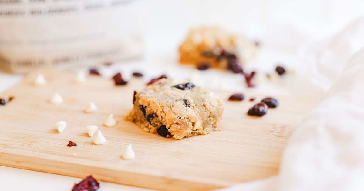 White chocolate cranberry bars on a cutting board